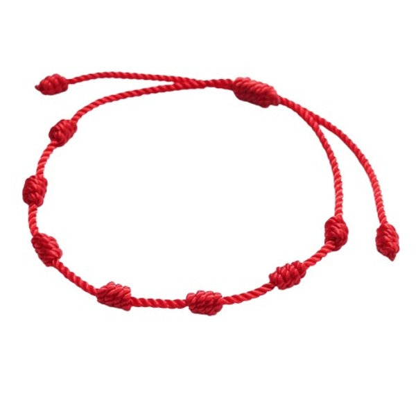 Pulsera de Hilo Rojo con 7 Nudos - Protección, Calidad y Estilo